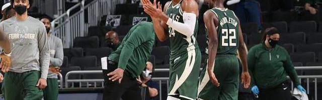  巴特勒三双热火加时险胜尼克斯  